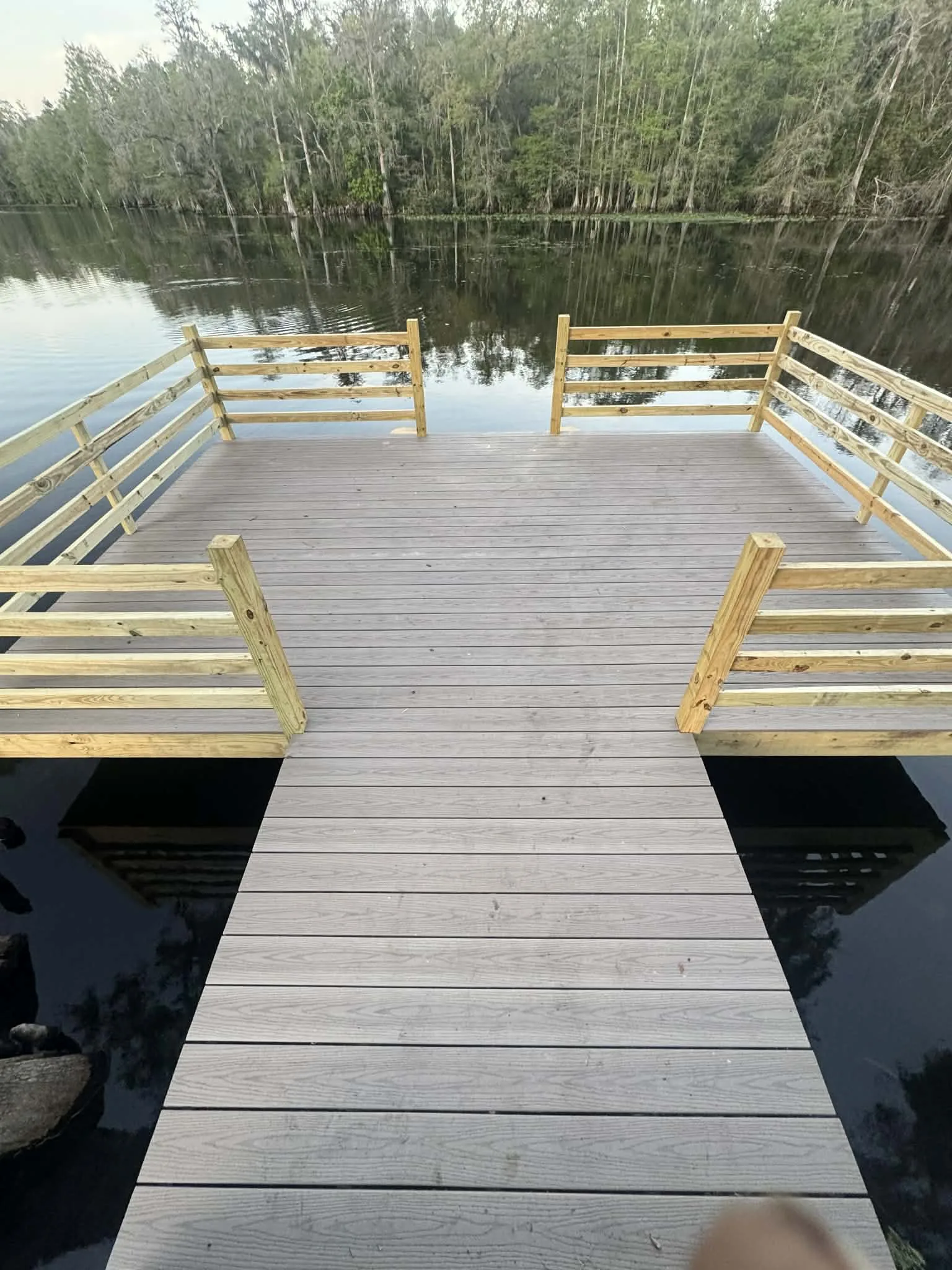 Lutz deck builders - dock deck with bench and railing
